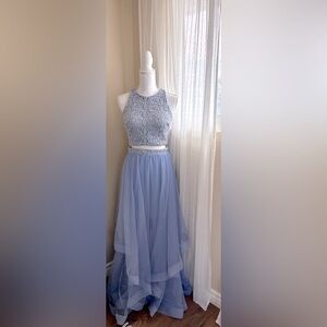 Elegant dress with lace detailing and a very soft purple blue color! Size 3-2